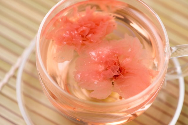 Cherry blossom (sakura) Japanese Herb tea on table.